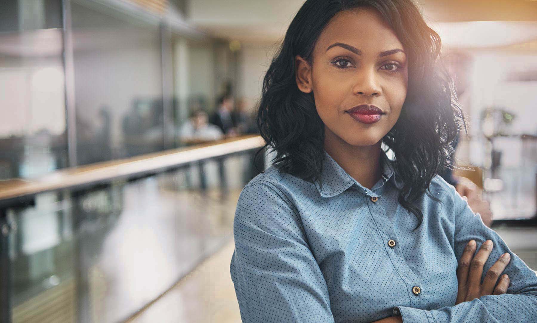 Confident woman with arms crossed