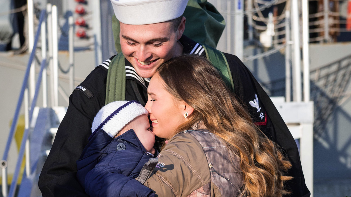 Sailor with wife and child.